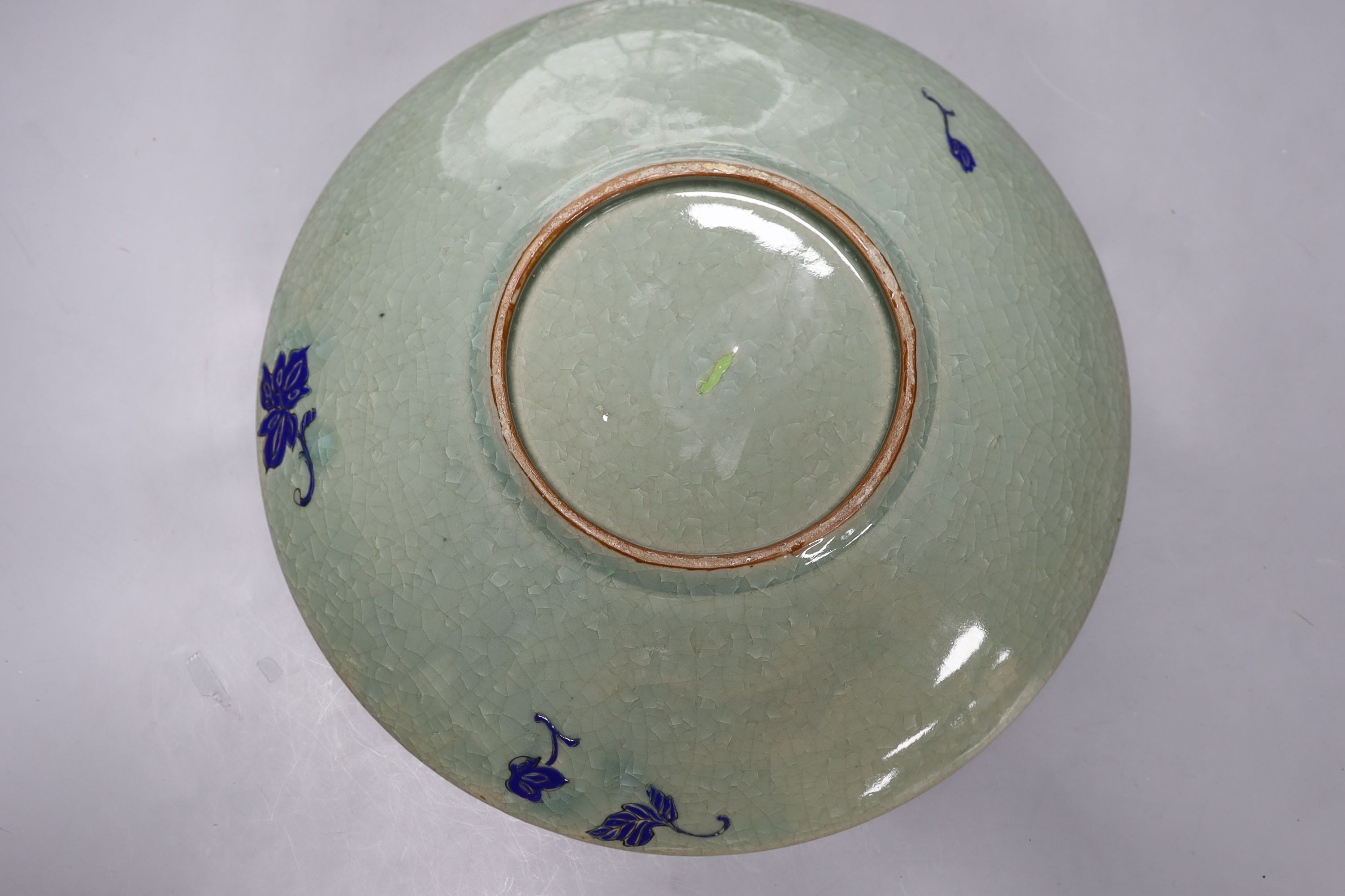 A pair of Japanese pottery moriage celadon ground dishes, early 20th century, 38cm